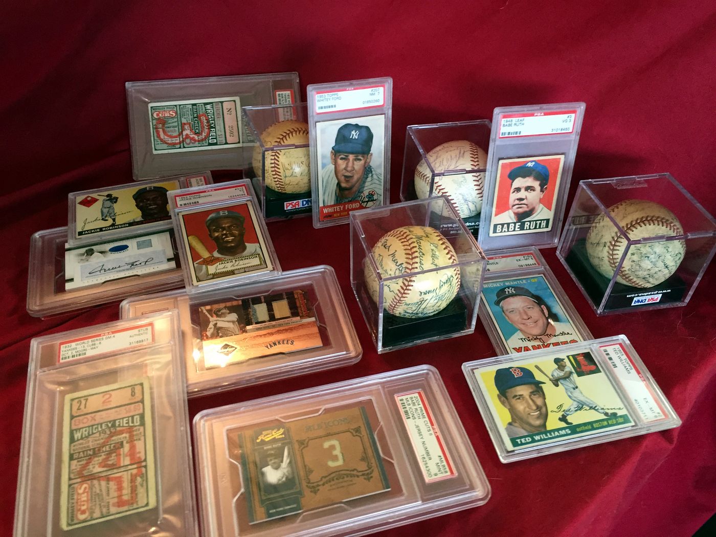 Signed baseballs, graded cards and sports memorabilia