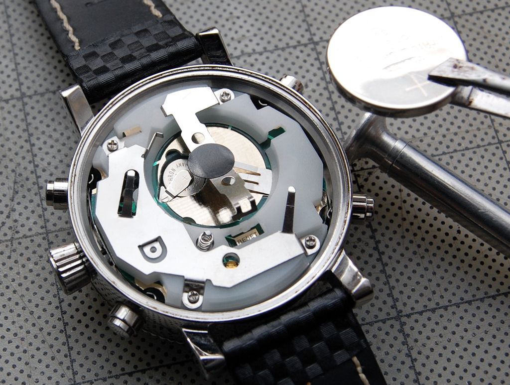 A watch opened up for a battery replacement